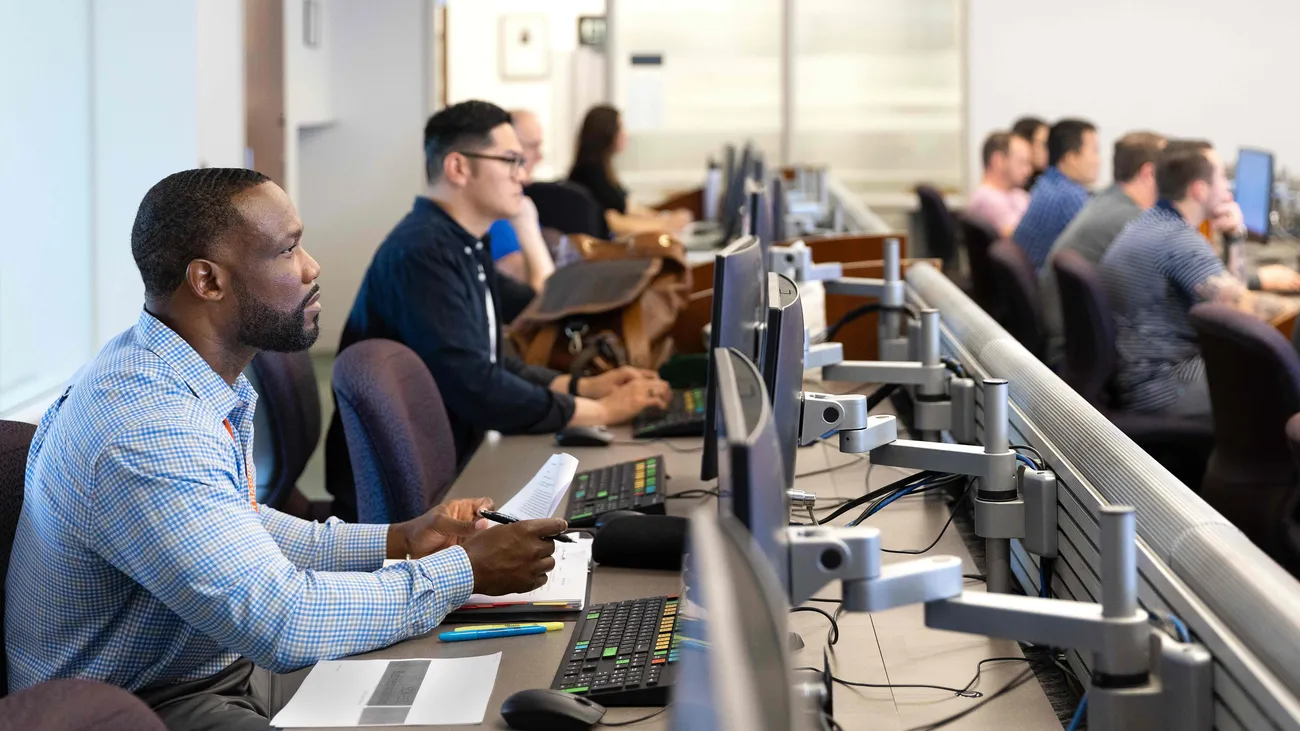 Students attend Professor Don Harter's Class in the Defense Comptrollership Program.