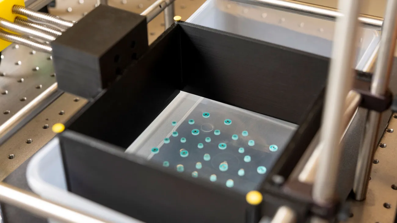 Model in a research lab used to study atoms in living and nonliving matter.