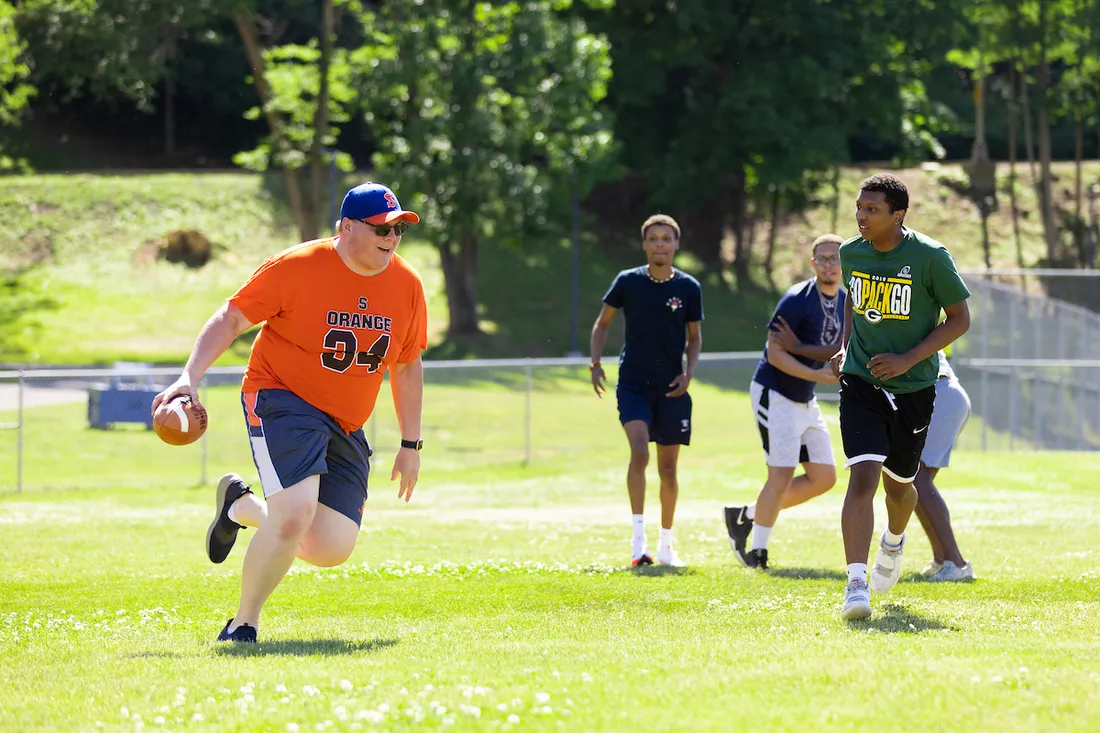 Students playing touch football.