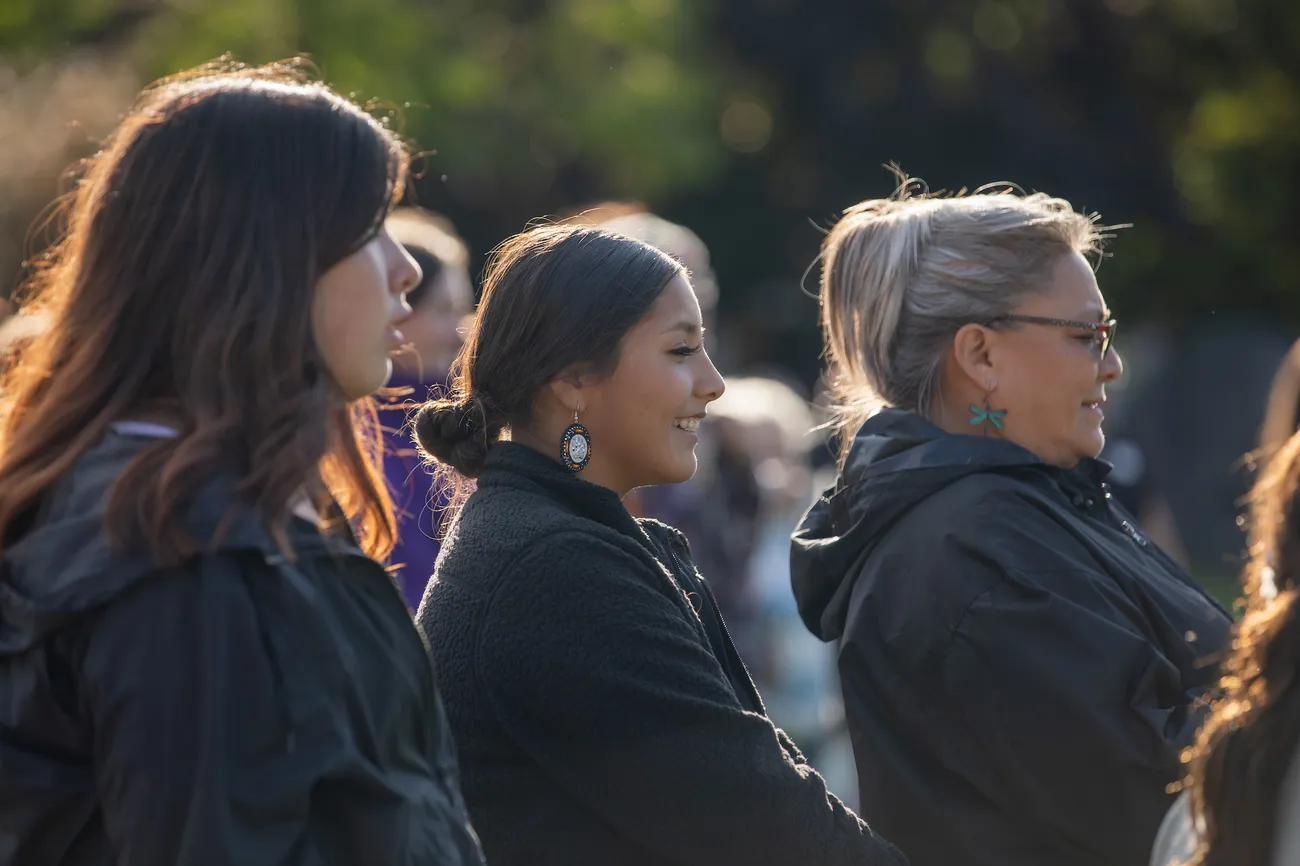 People standing together and smiling.