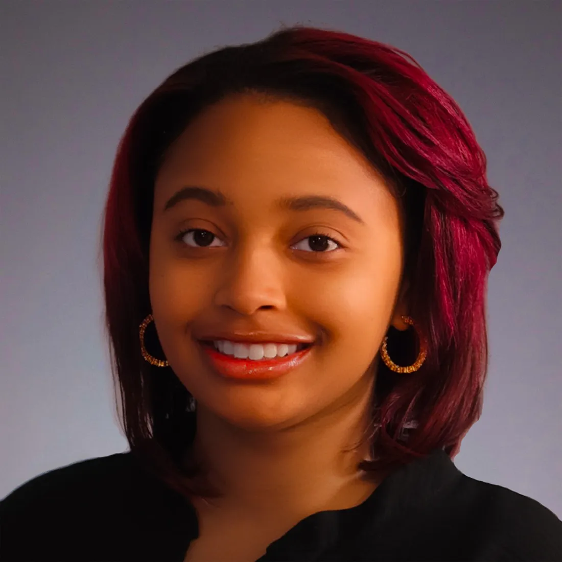 Sa'Cora Sneed smiling.