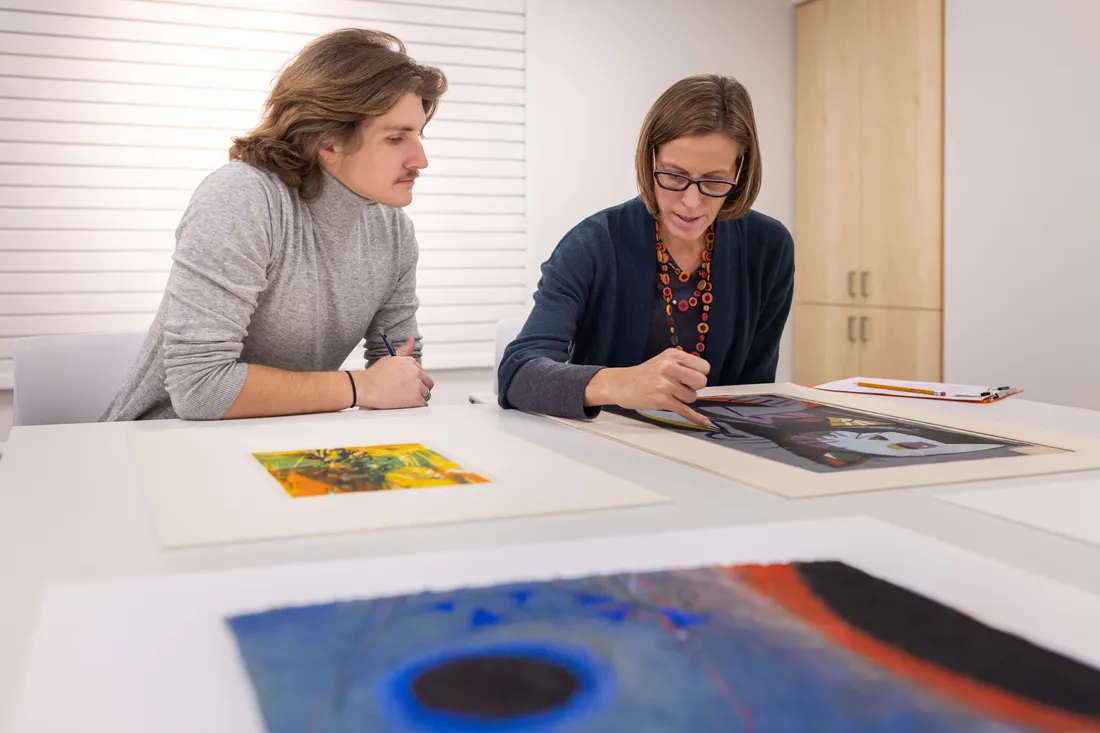 Professor Sascha Scott during museum review with a student.