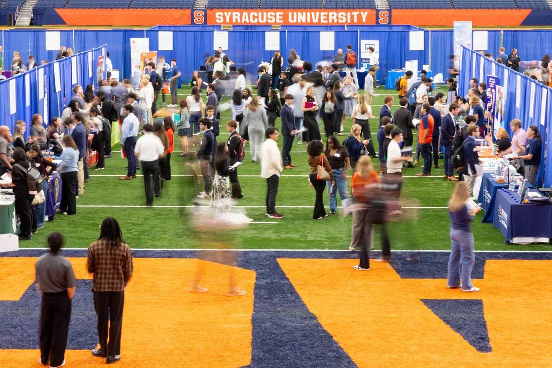 People walking in the dome during a career fair.