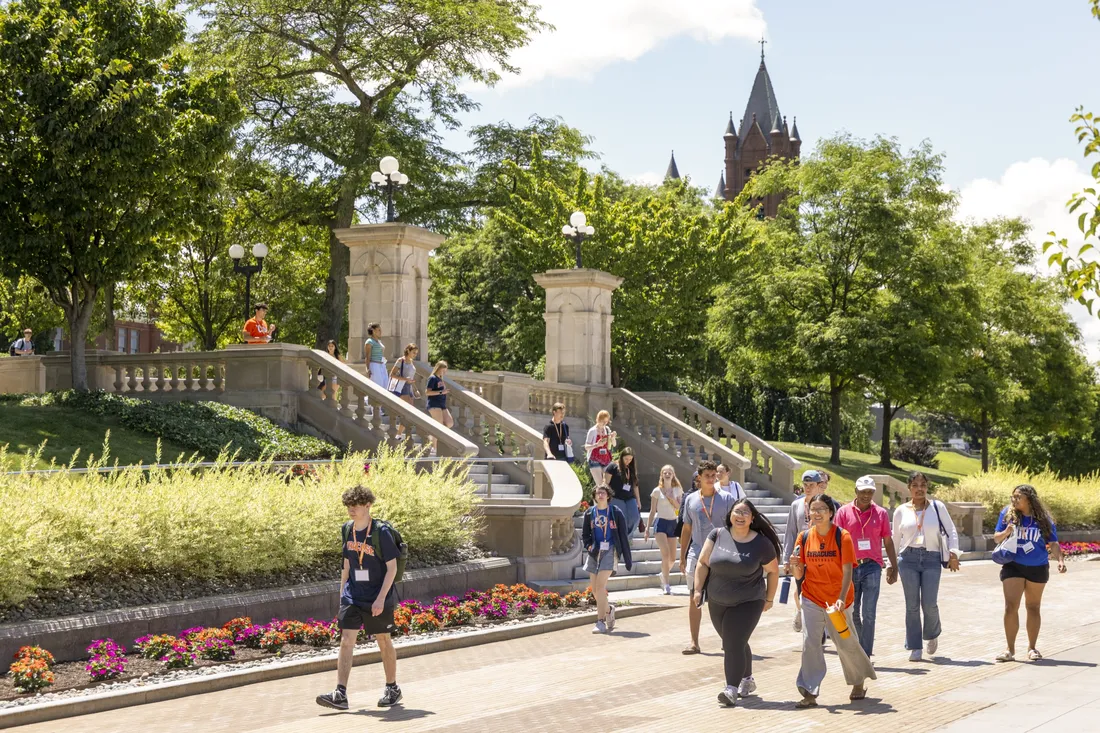 Students walking along the Einhorn Family Walk on campus.