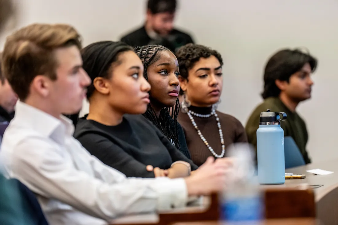 People listening to a lecture at the CUSE 50 Summit.