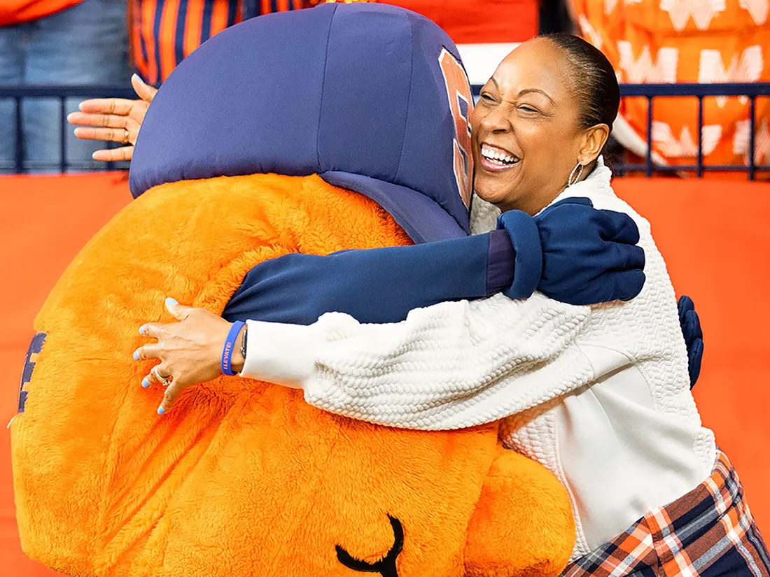 Otto hugging a woman.