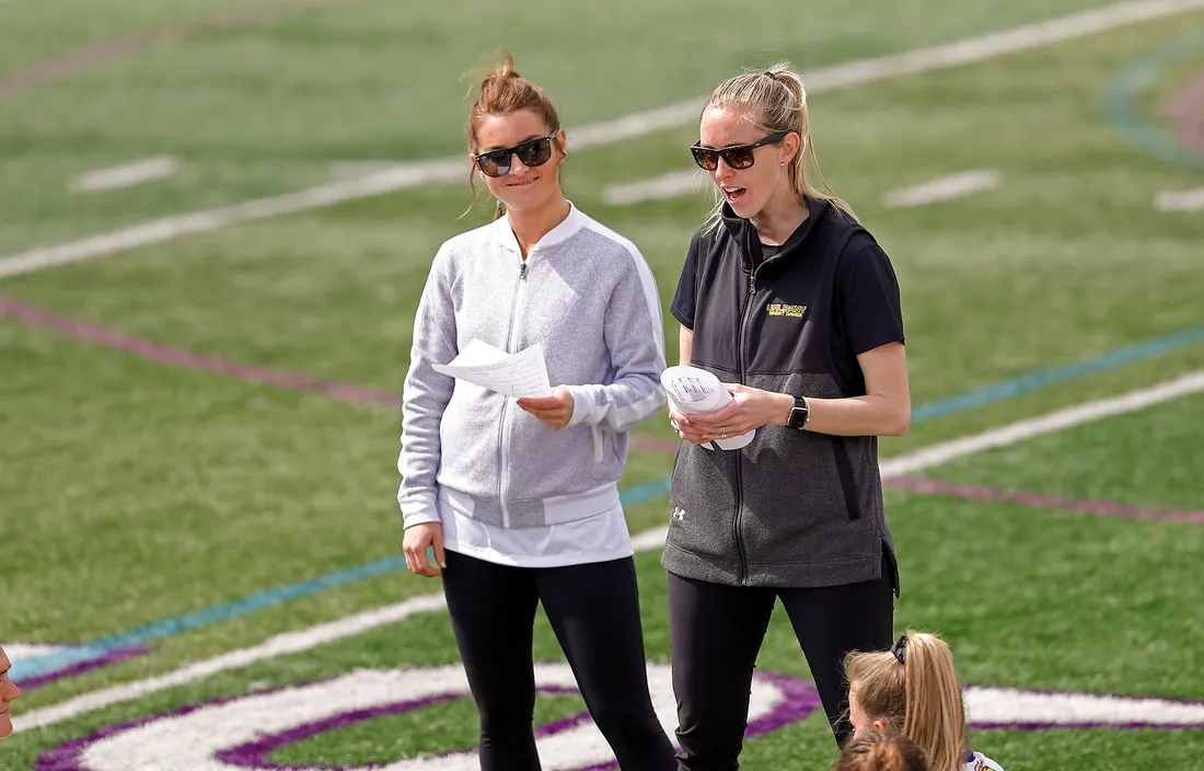 Katie Rowan Thomson ’09 coaching on the sidelines.