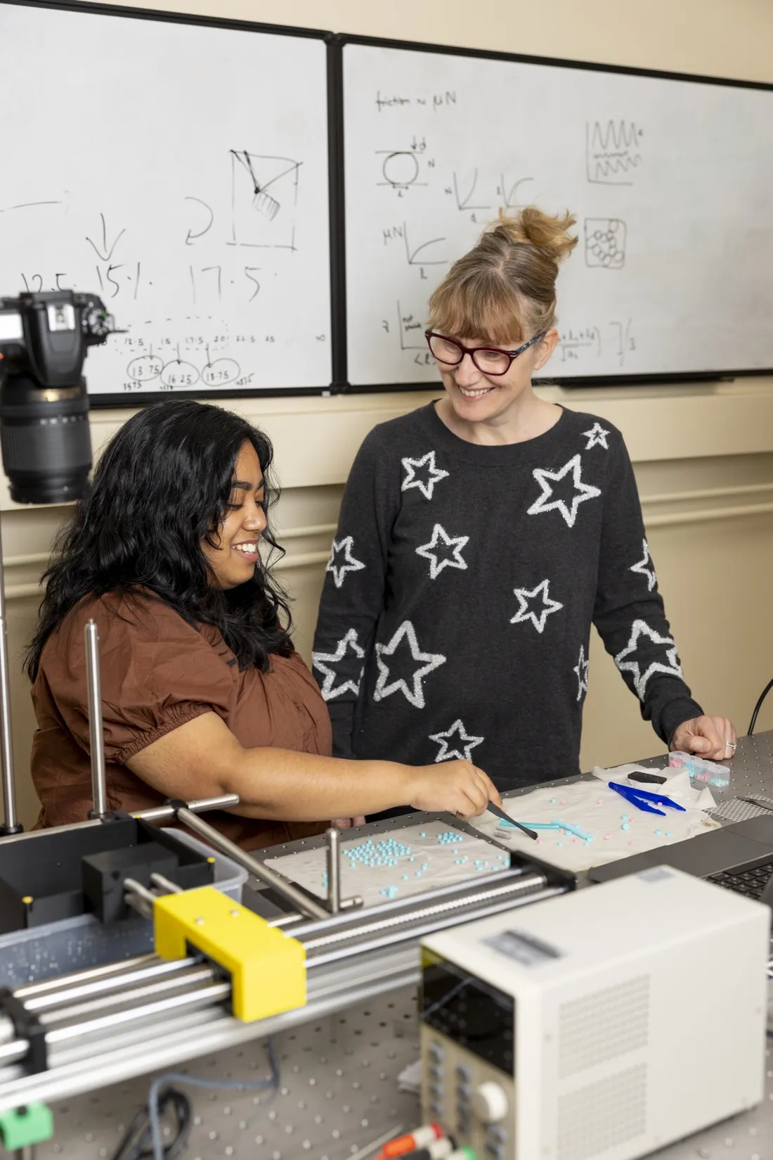 Professor working with a student in the lab.