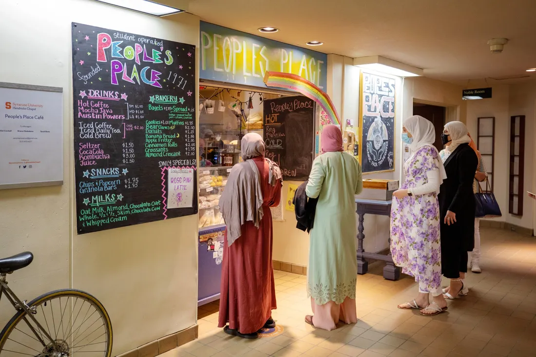 Customers at People's Place Café in Hendricks Chapel.