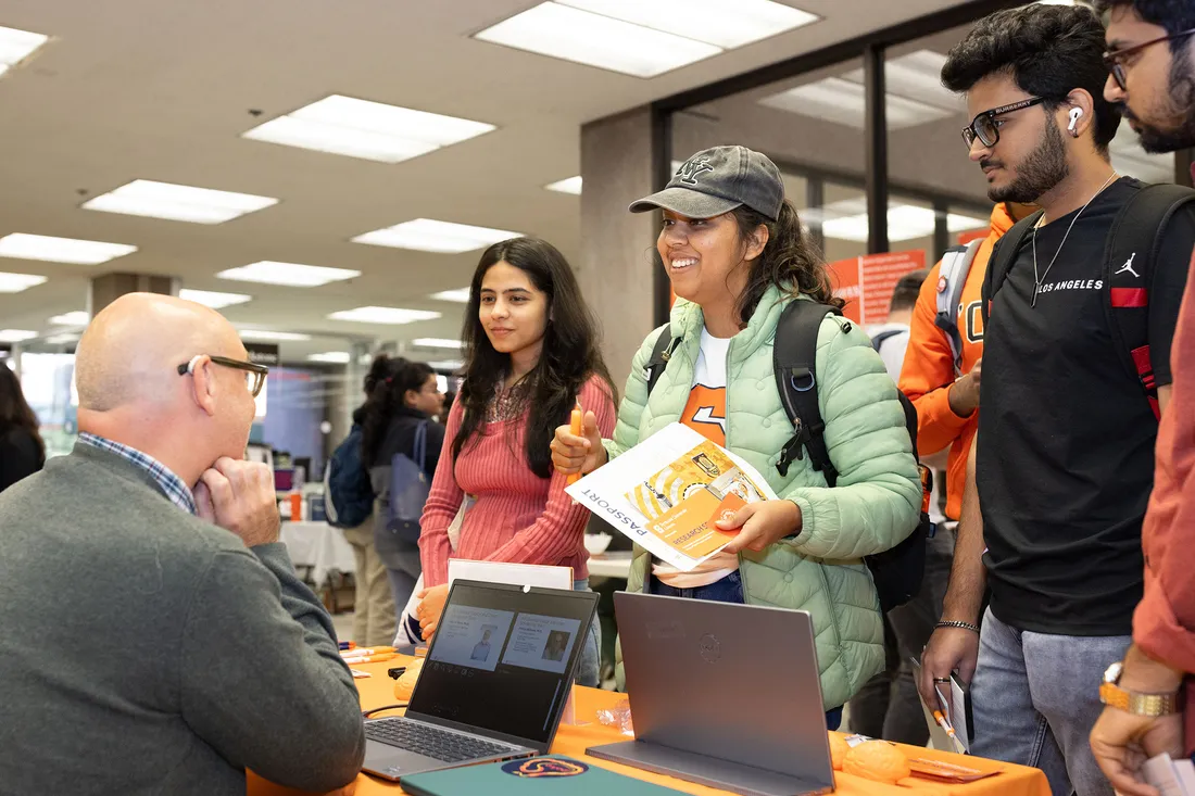 People signing up for clubs and organizations.