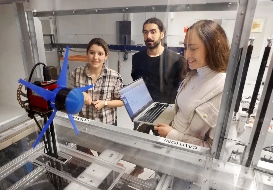 Students working on a 3D printed prototype of wind-energy propeller.