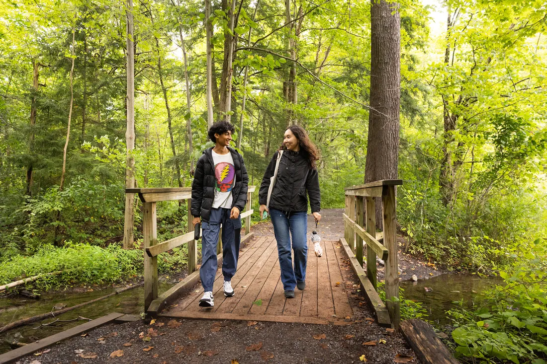 Students walking ouside at Green Lakes State Park.