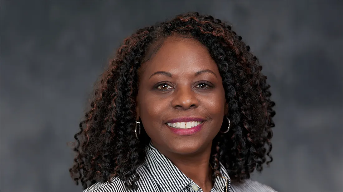 Pamela Lane smiling.