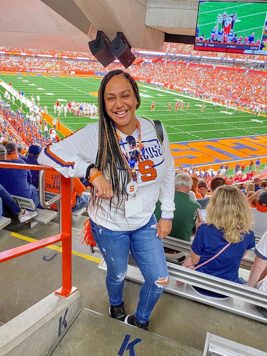 Dayanna Torres poses for a photo in the Syracuse Carrier Dome on game day.