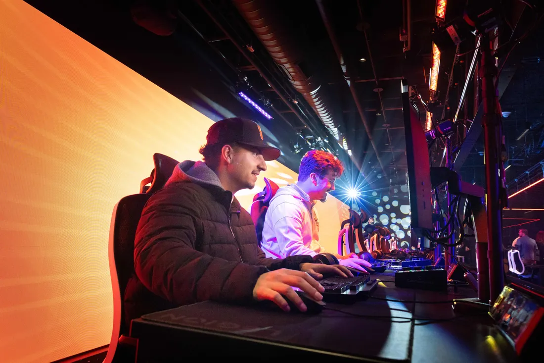 Students in the eSports room playing games.