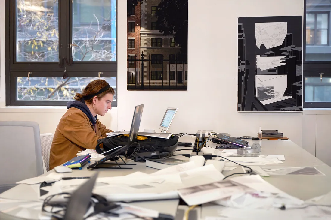 Person working at desk.