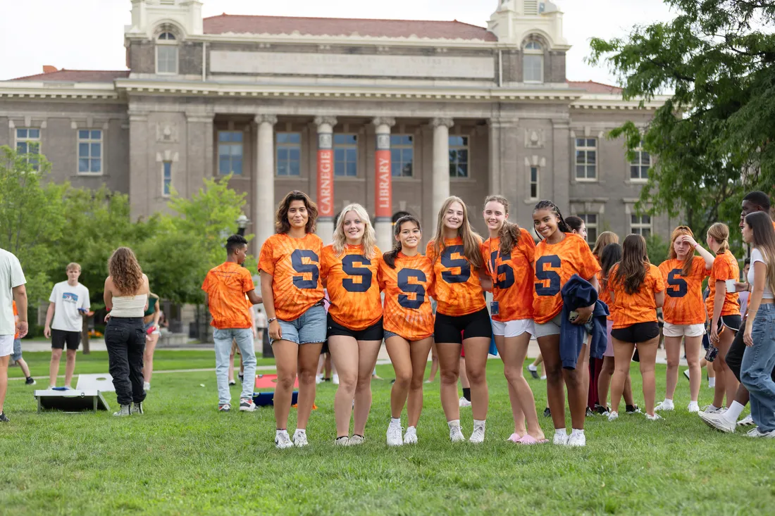 A group of students on the quad on the campus of Syracuse University.
