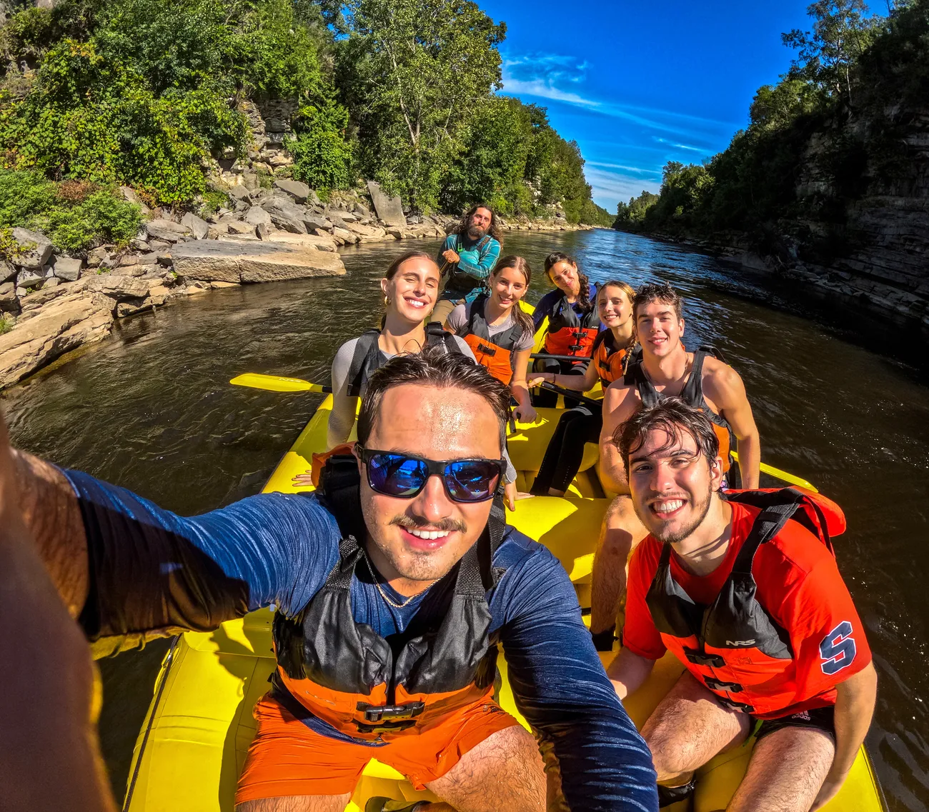 Students white water rafting.