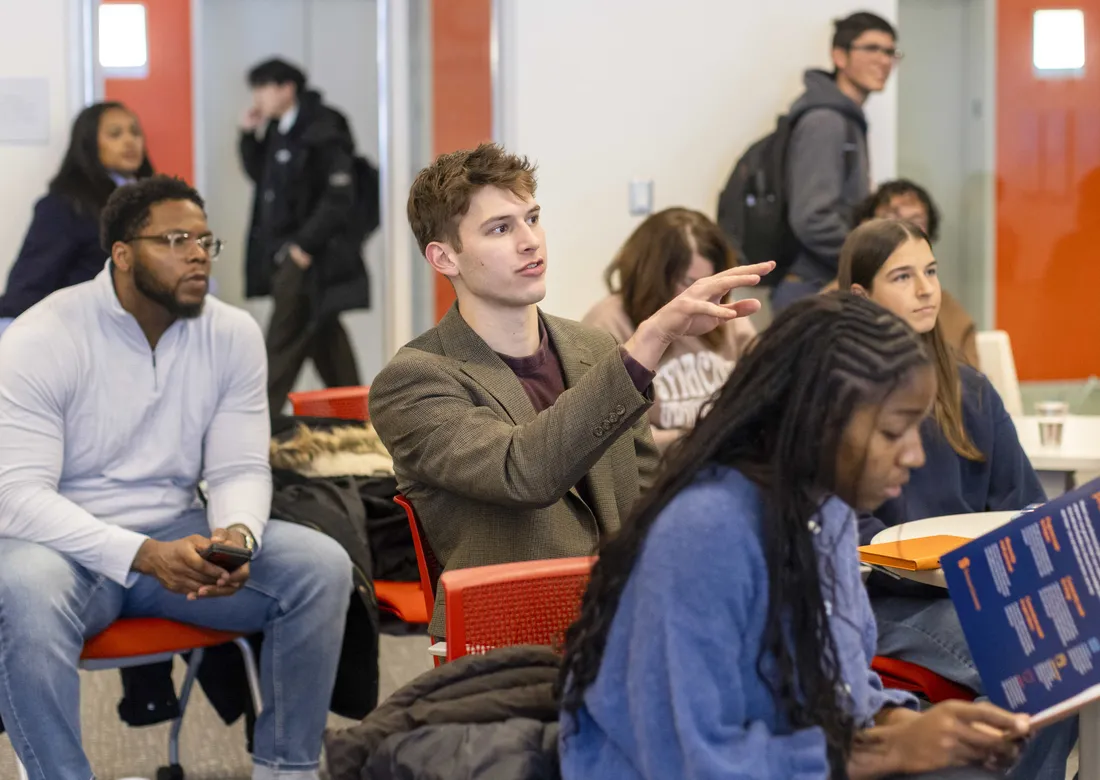A cass listening to alumni Frank Shultz speaking at the Couri Hatchery incubator space.