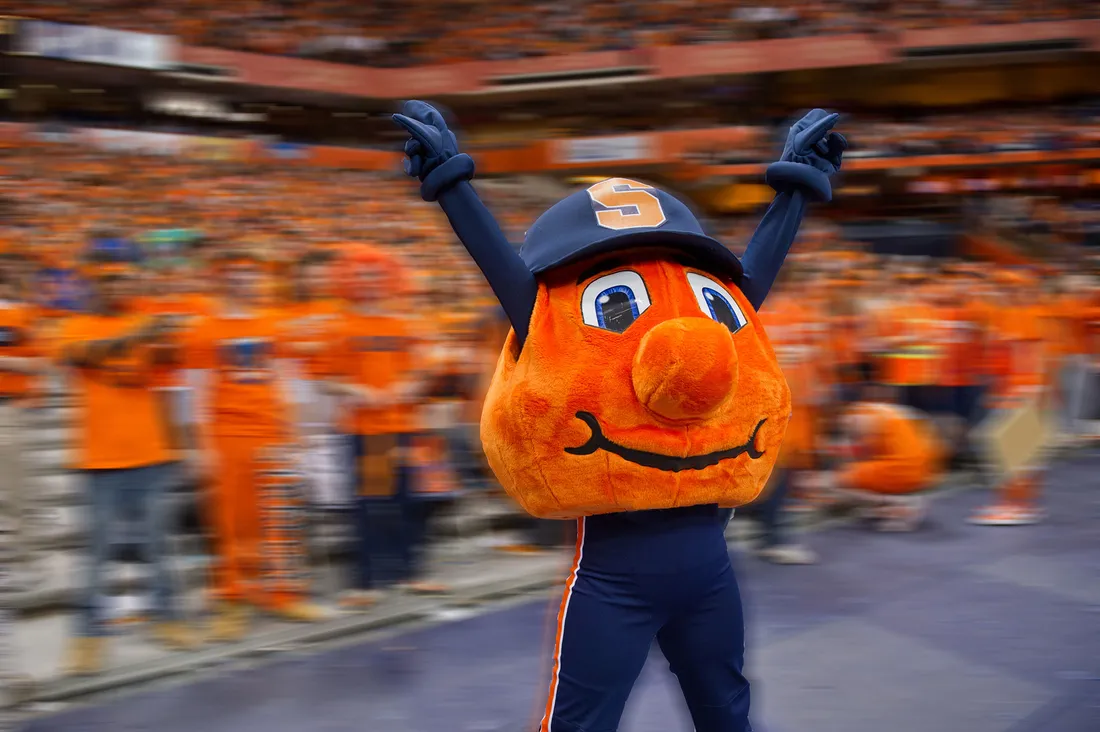 Otto the orange mascot cheering during a game in the JMA Wireless Dome.