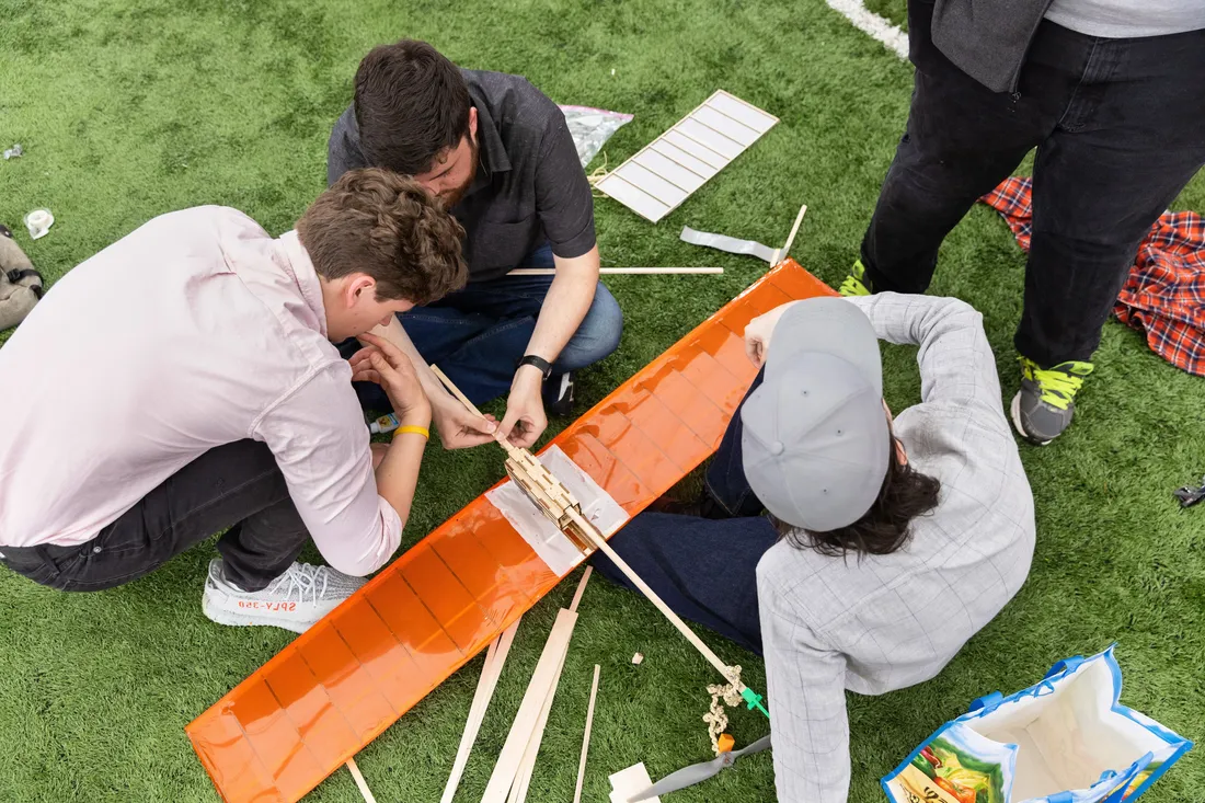 Engineering students work on project.