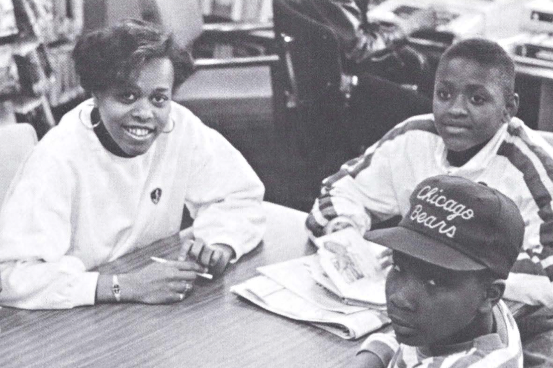 A young Sharon Owens working alongside youth in the Syracuse community.