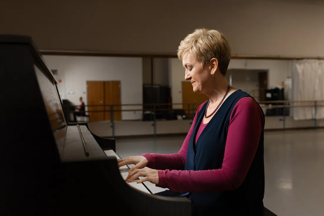 Kathryn Fathers playing the piano.