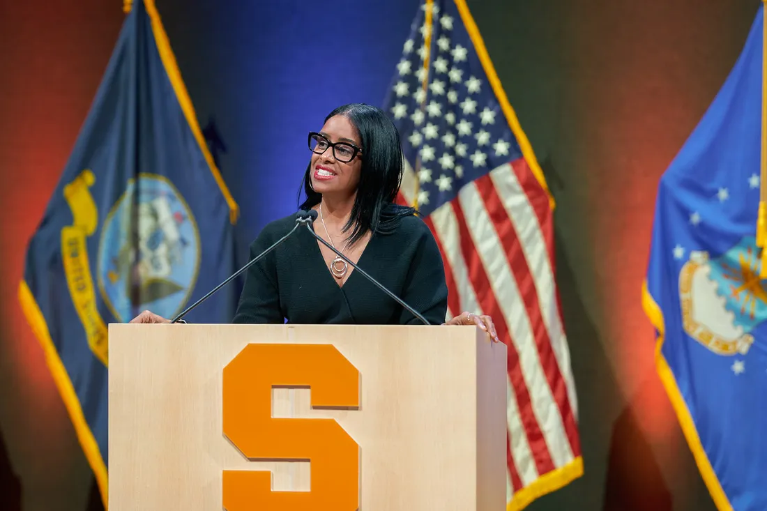 Person talking at a podium.