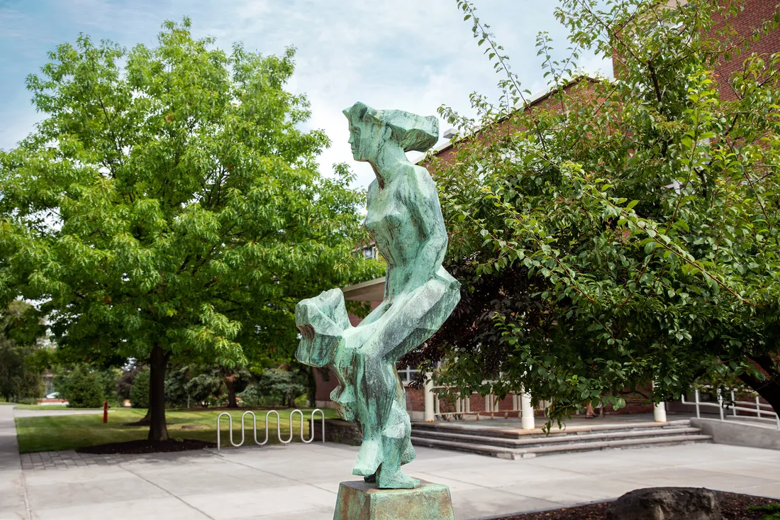 Statue of the Dancing Mother, located in between Hinds Hall and H.B. Crouse Building