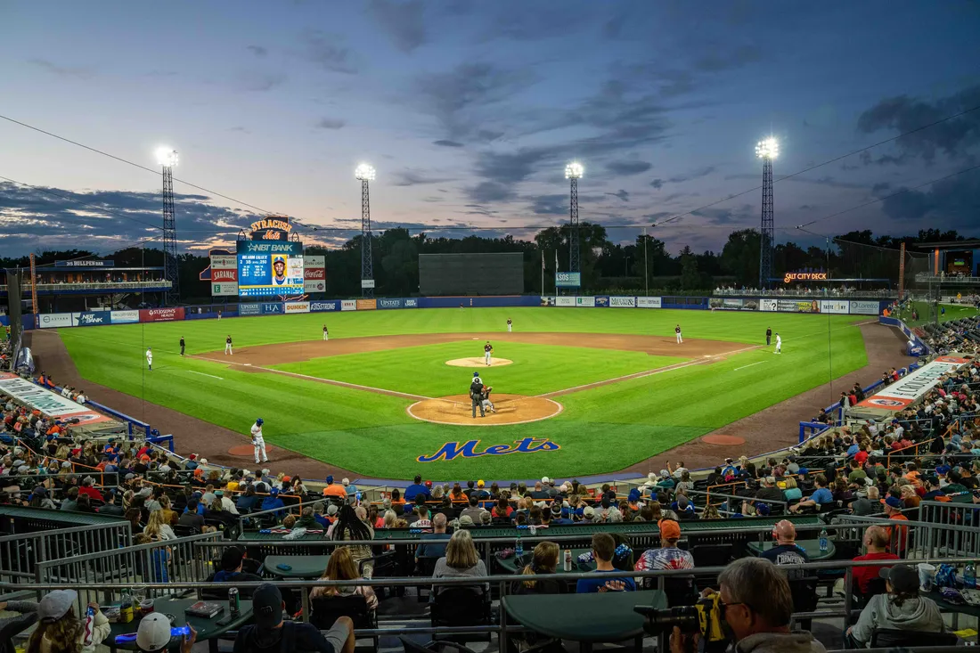Syracuse Mets baseball game in the evening.