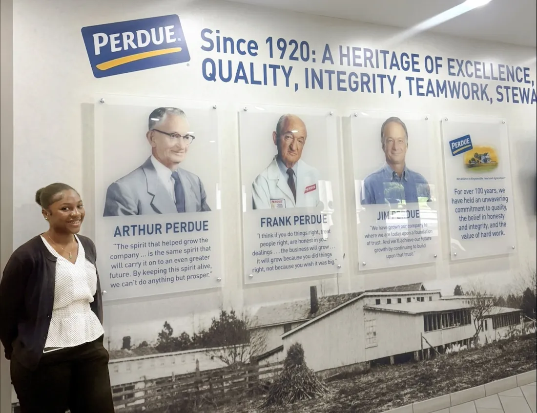 Nateé Okrah ’27 standing inside of the Perdue Farms building for her summer internship.