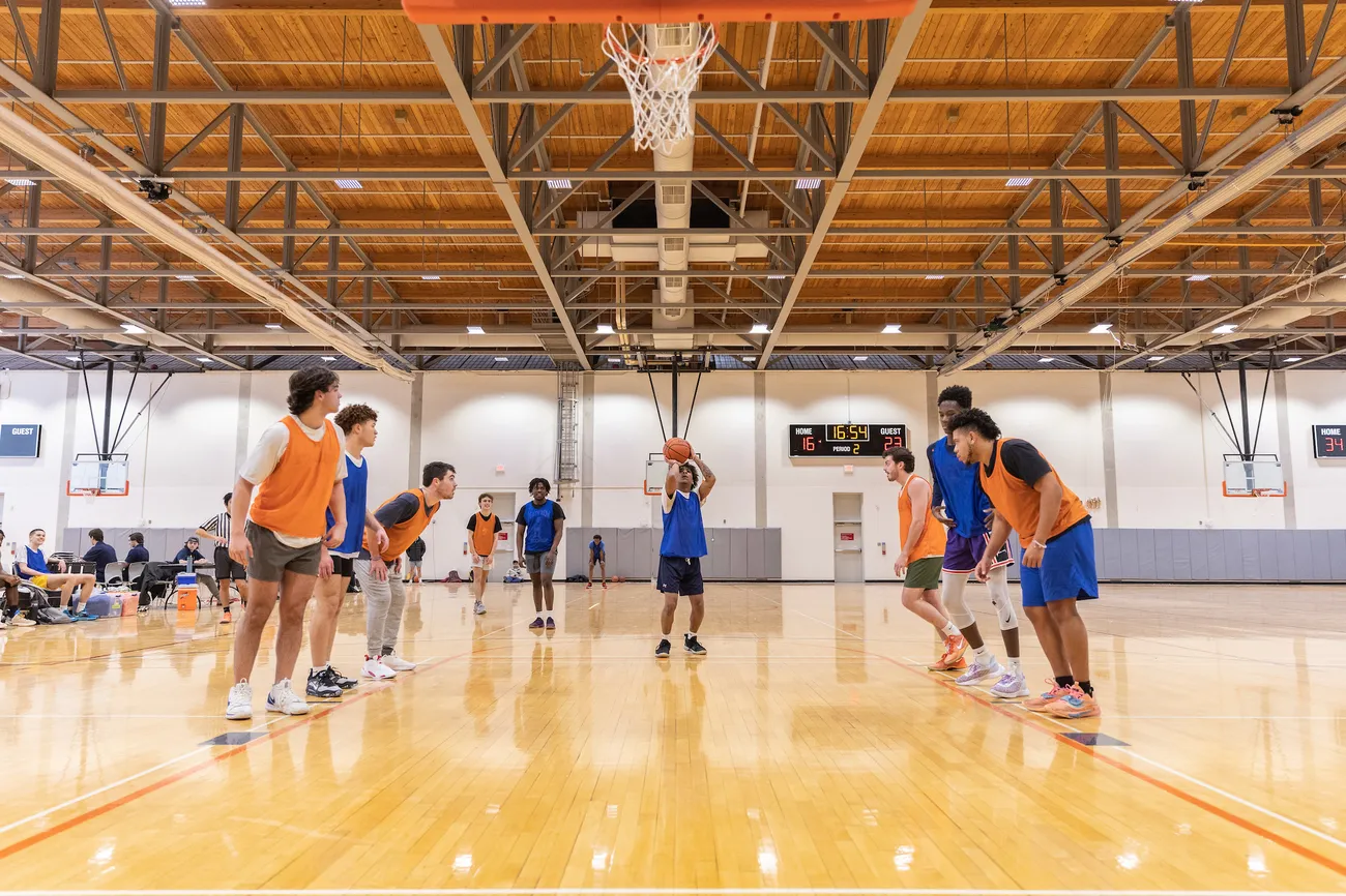 Students play an intramural basketball game.