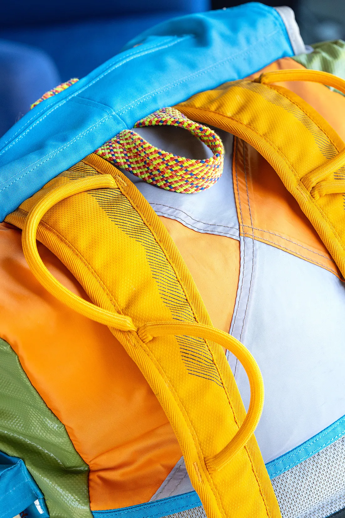 Bright colored backpack zoomed in.