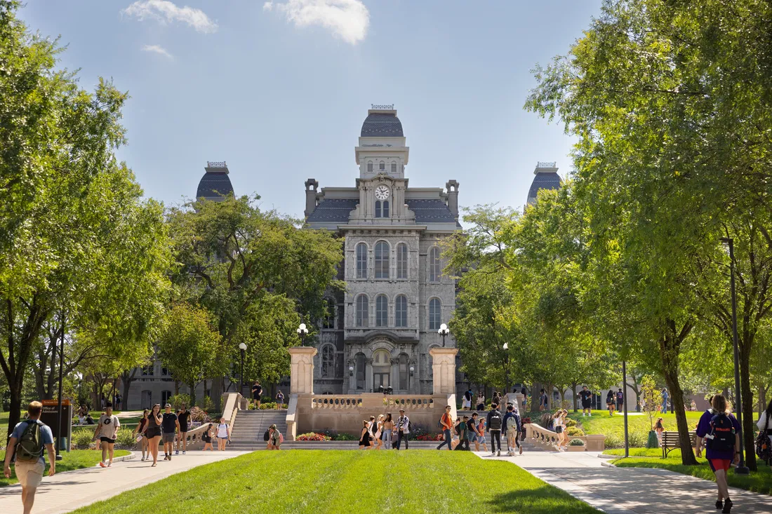 Students walking on campus outside the Hall of Languages.