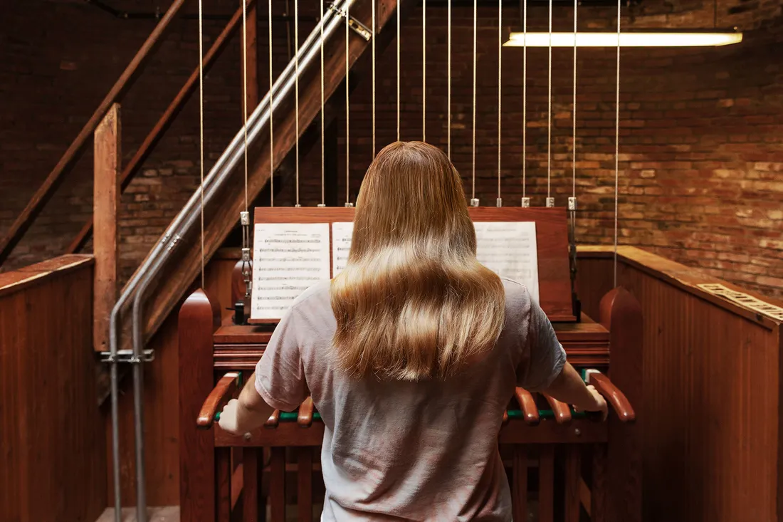 Girl playing the chimes.