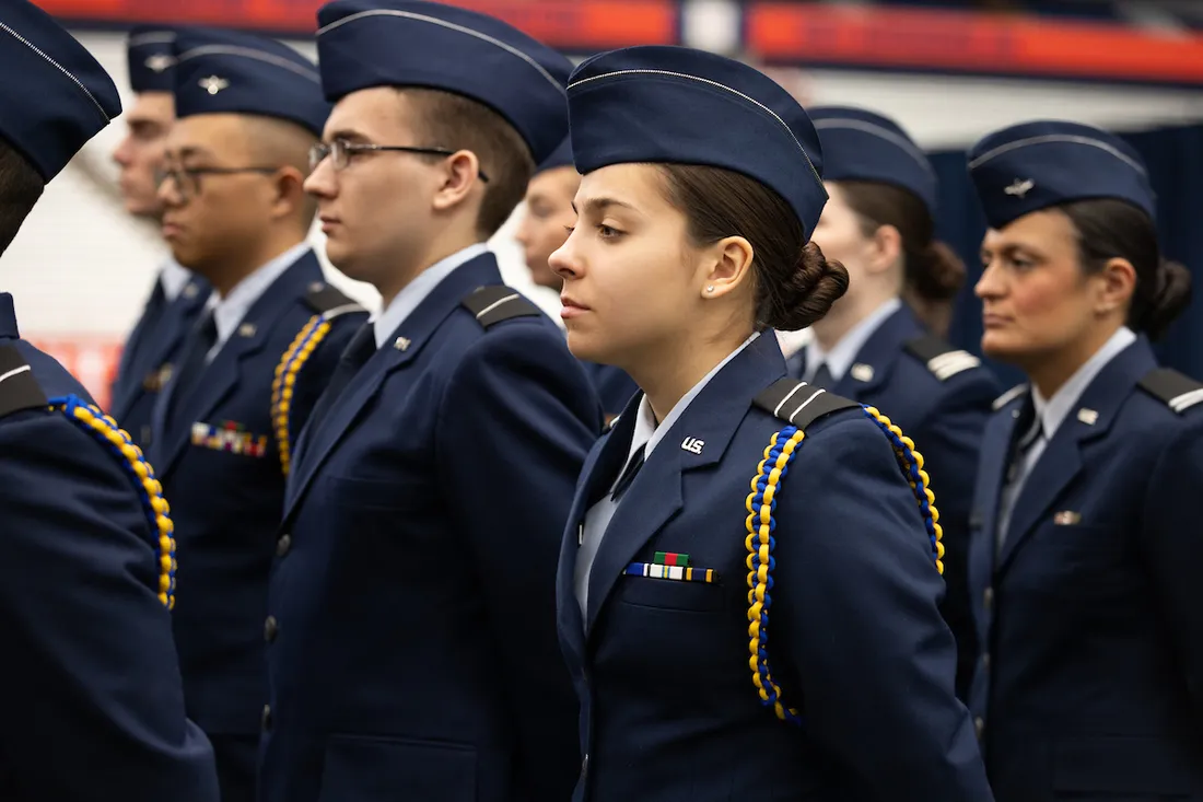 Student veterans standing in uniform.