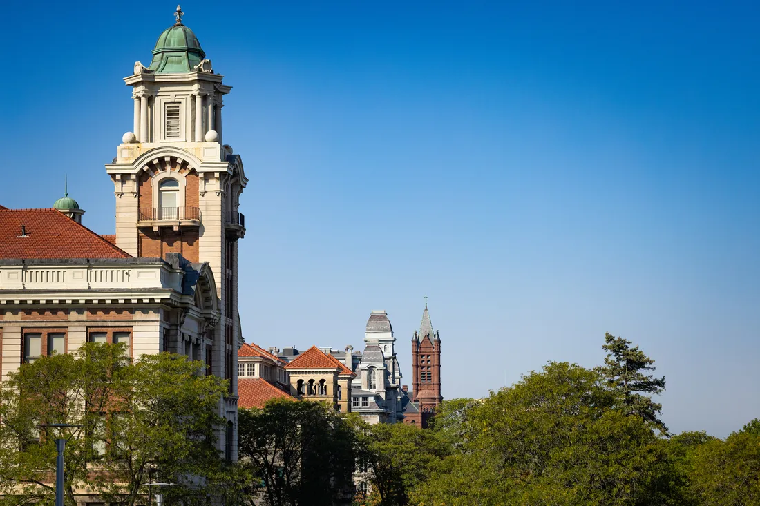 The exterior of older campus buildings at Syracuse University in the Fall of 2024.