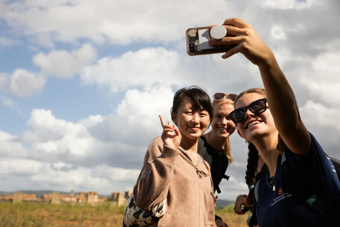 People taking a selfie.