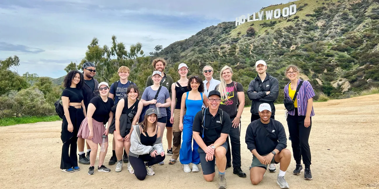 Professor Tim Hooten hiking with students at the Hollywood sign in Los Angeles.