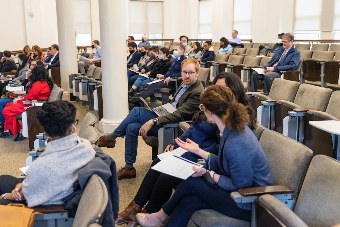 People inside a classroom in the graduate school.