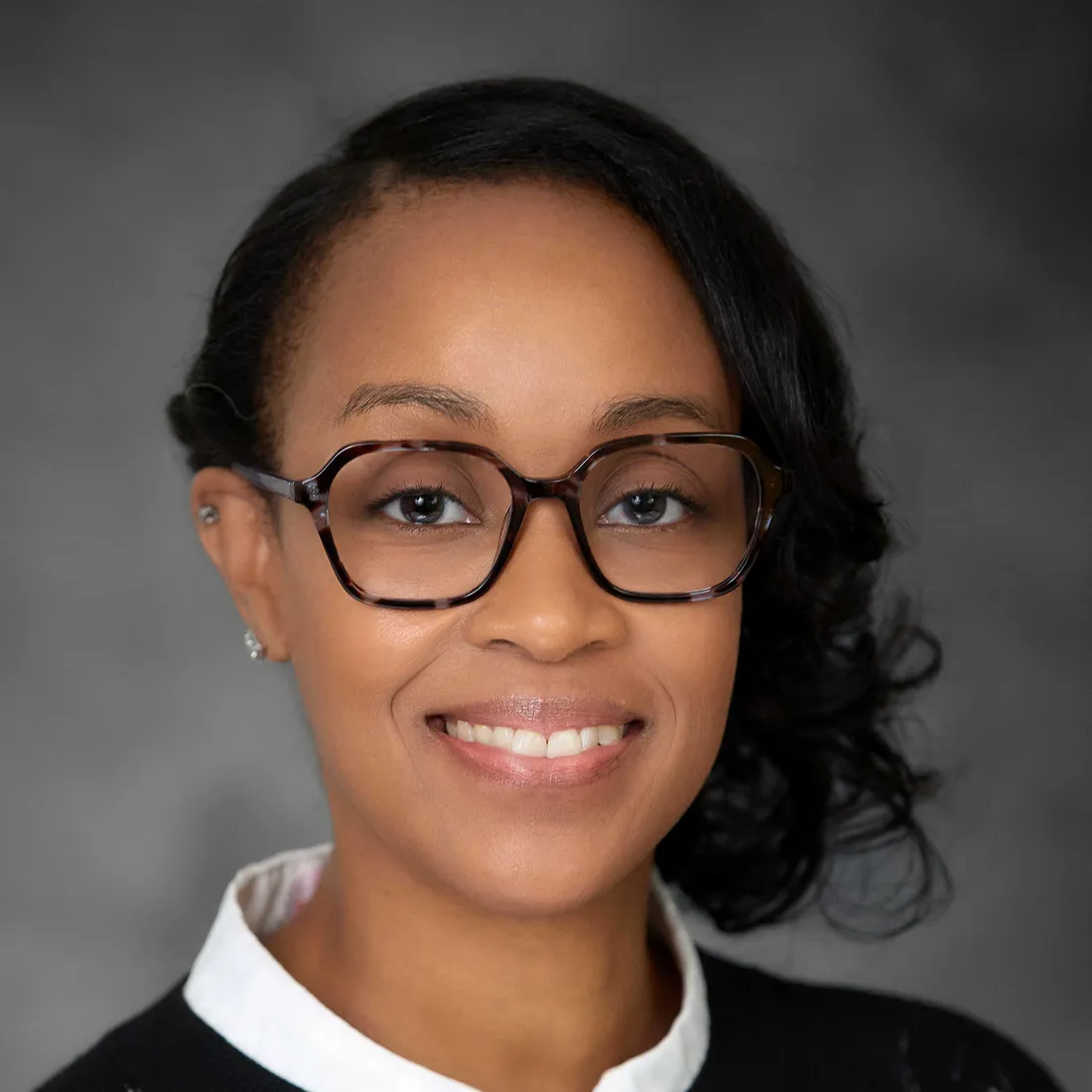 Erica Wynn-Kearse smiling.