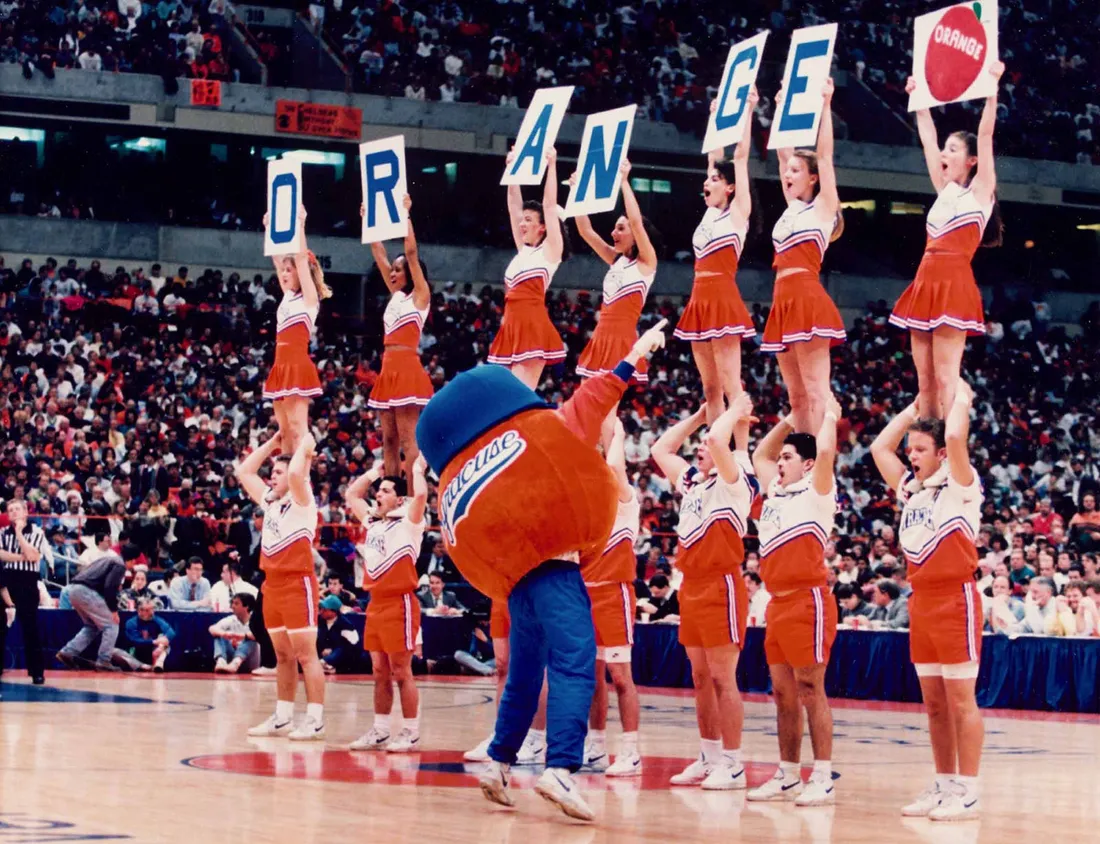 Archived cheerleaders at a basketball game.