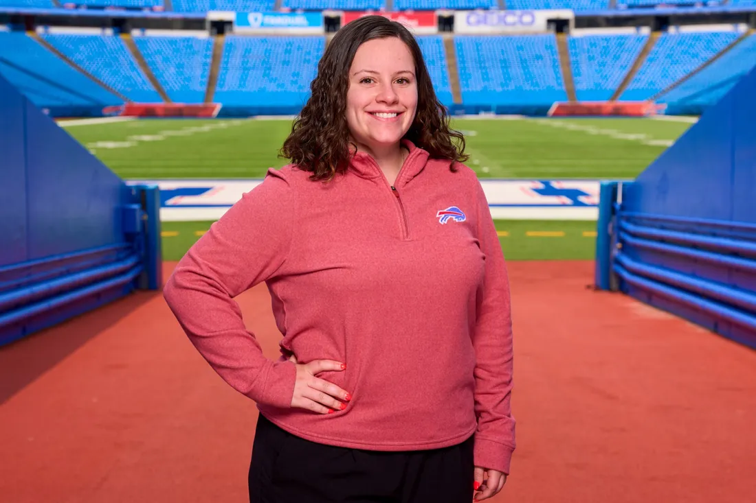 Mackenzie Mangos '22 posing at the Buffalo Bills stadium.