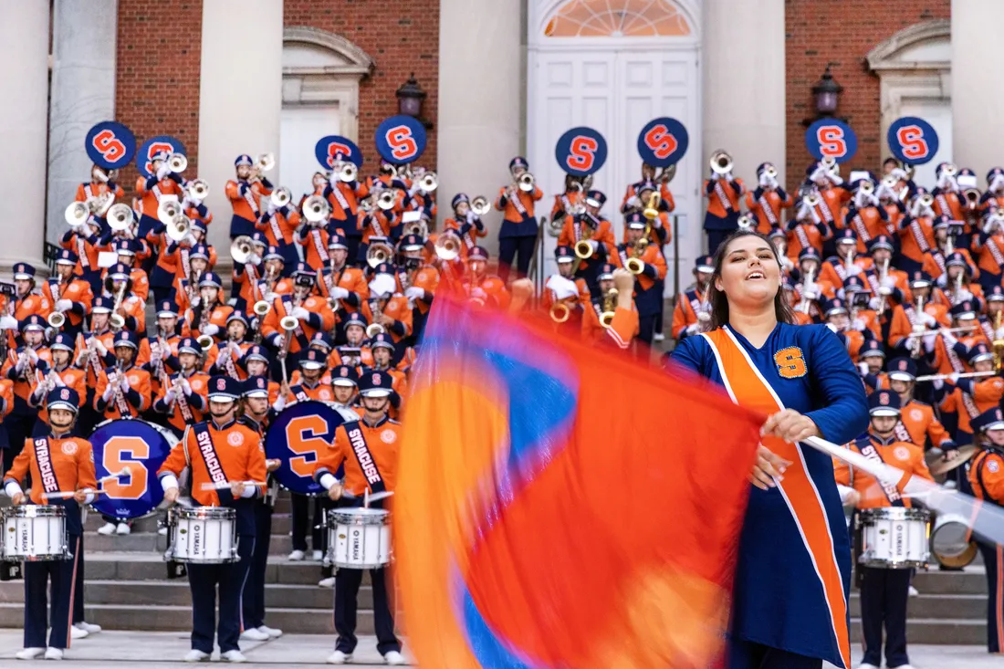 Photo of the marching band performing outside.