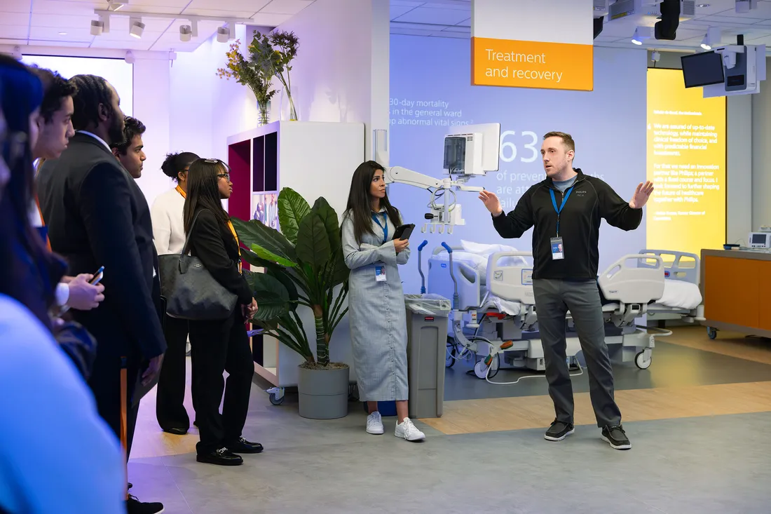 Chris Bonis talking to a group of people at Philips Healthcare.