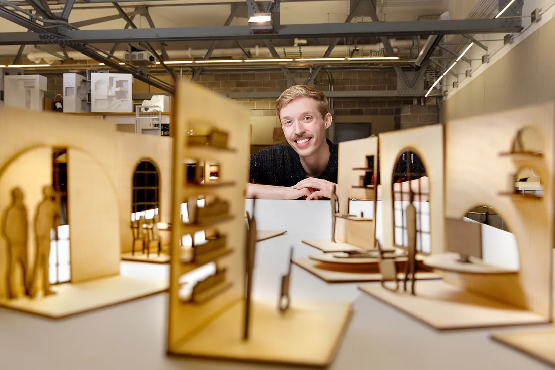 Erik Bakken in front of his work.