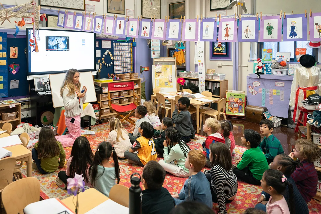 Person teaching students.