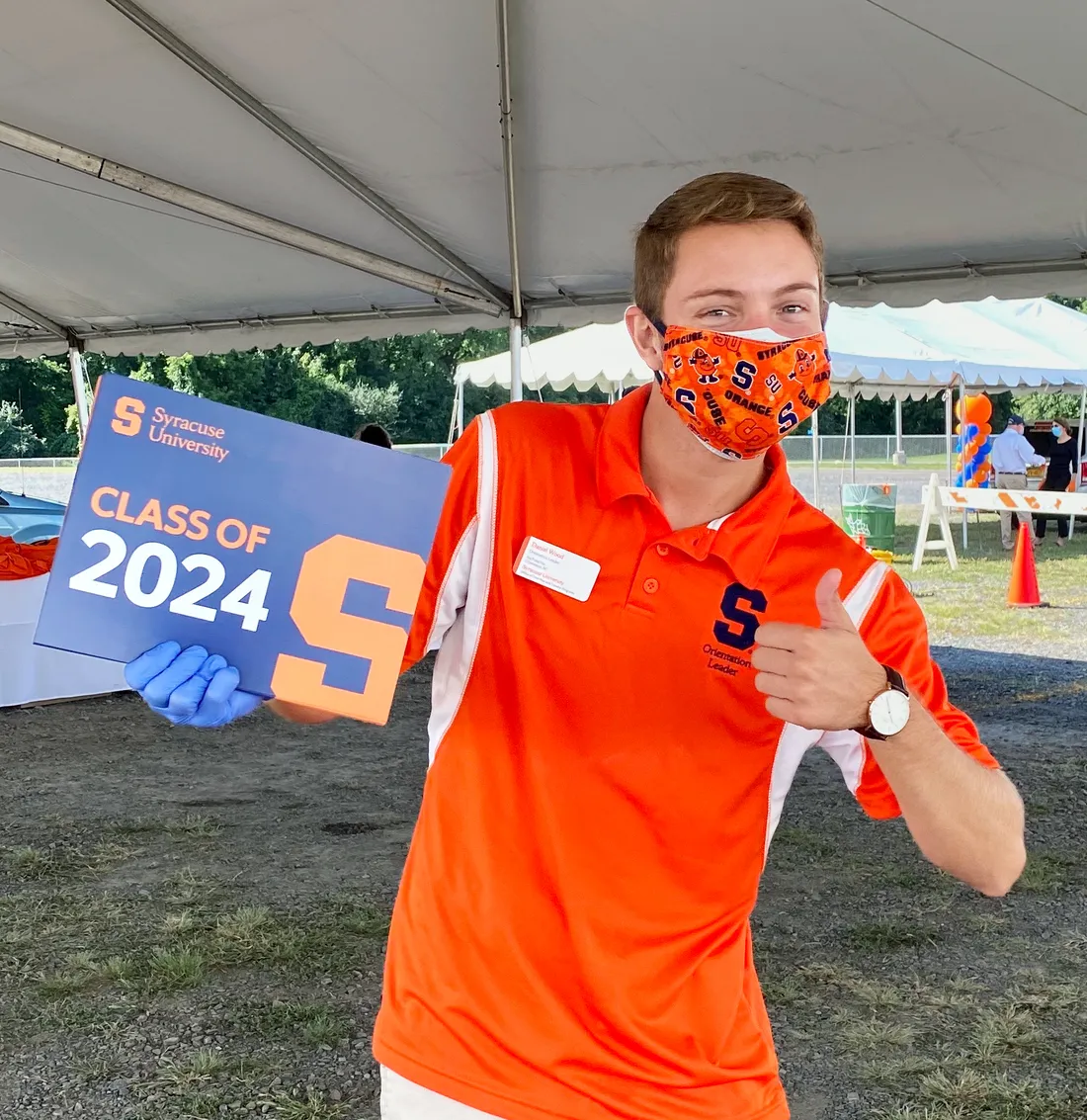 Daniel Wood poses on the quad while working as an orientation leader for incoming students arriving on campus