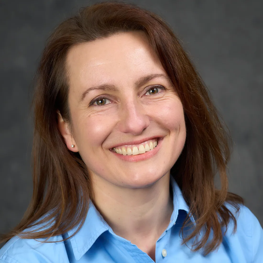 Victoria Tumanova smiling.