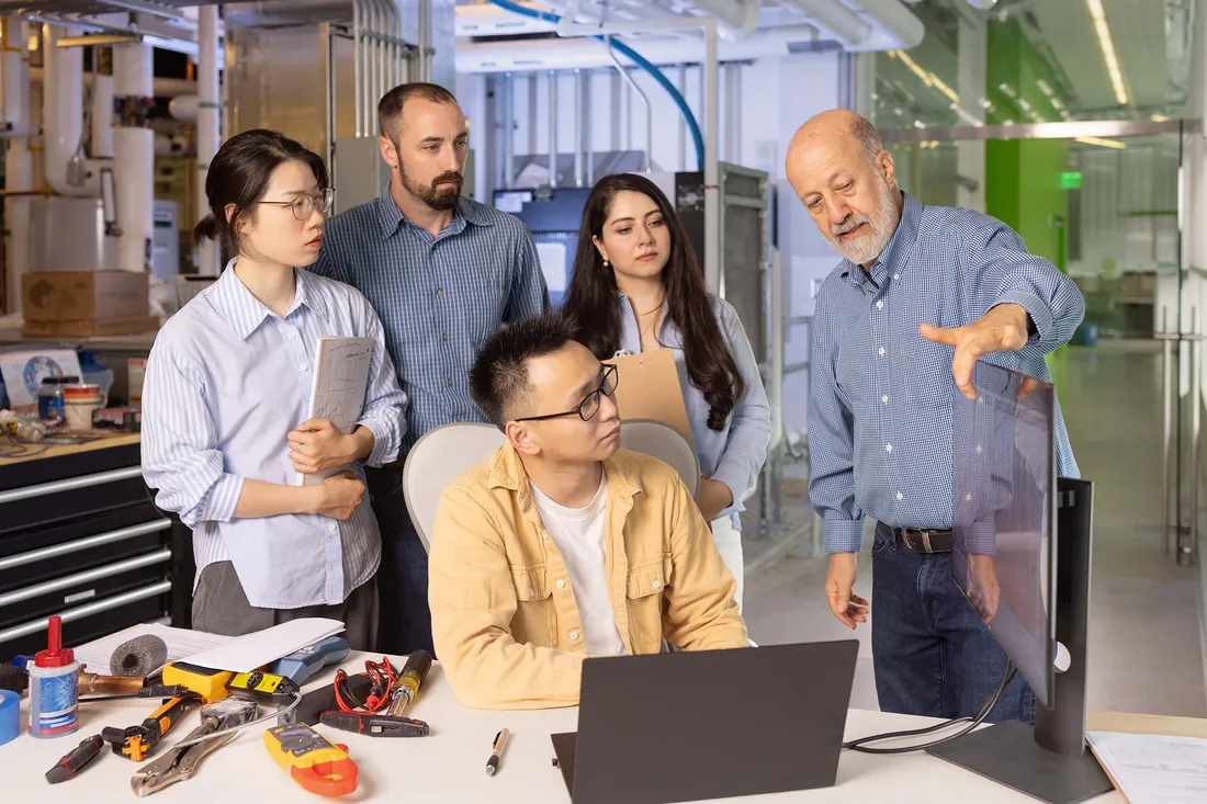 College of Engineering and Computer Science students designing eco-friendly heat pumps.